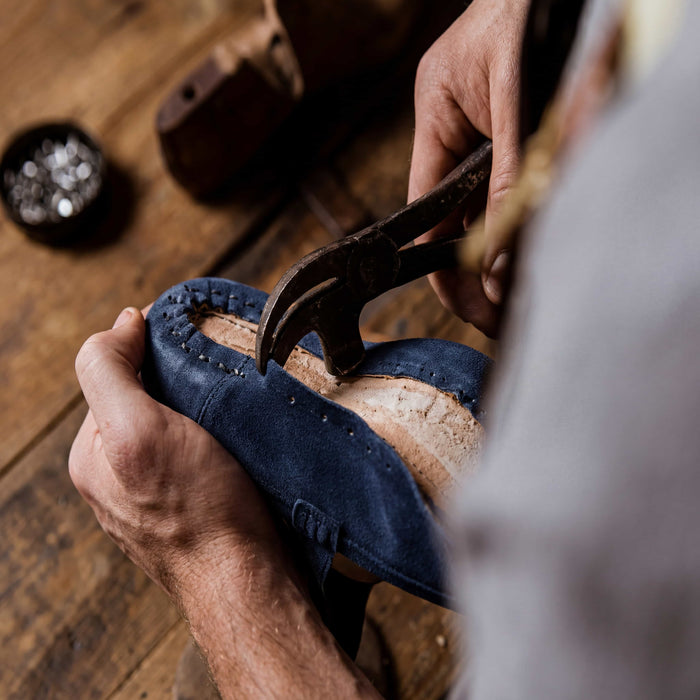 Hand-stitching the Sole